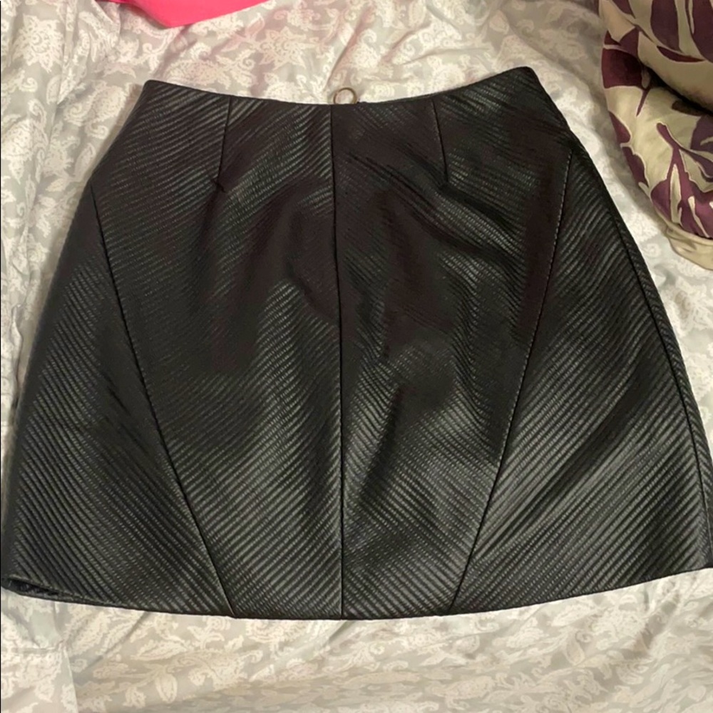 Black leather mini skirt
